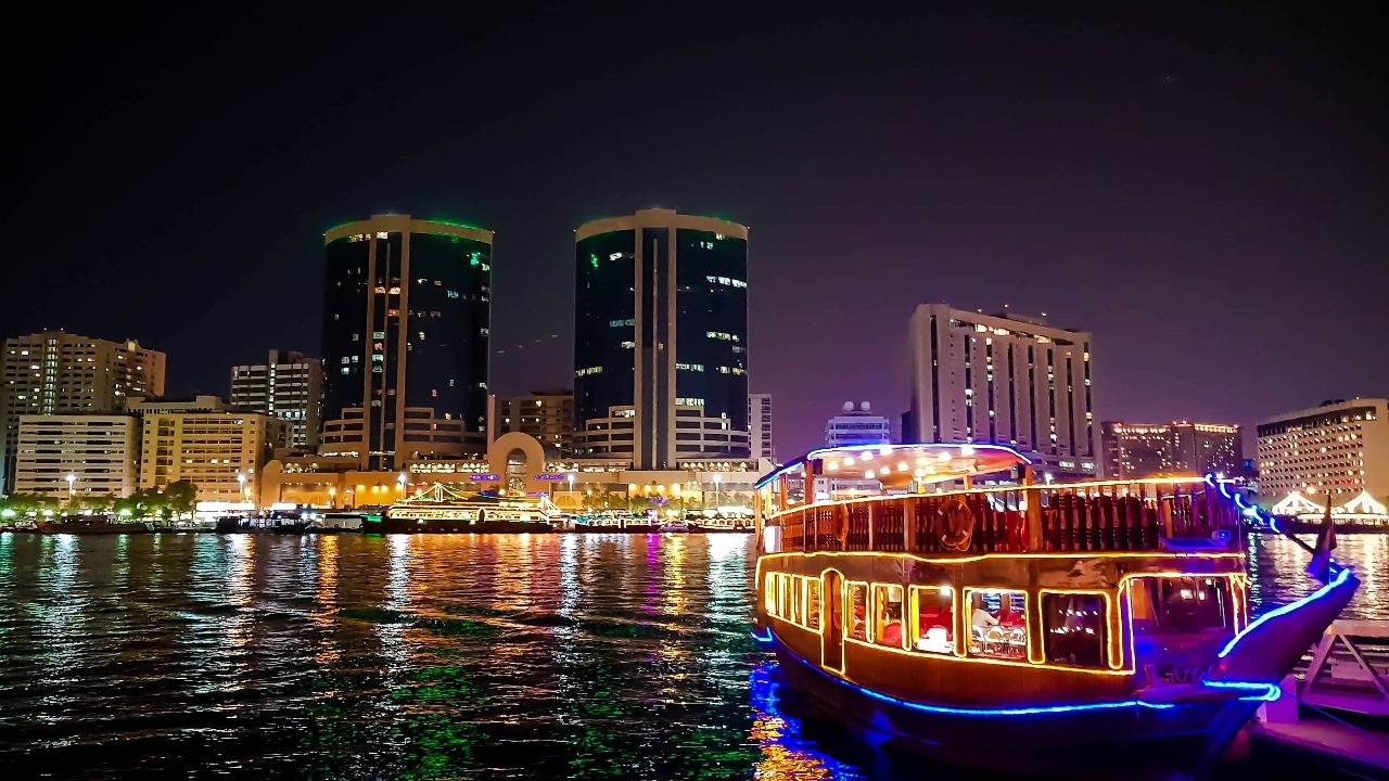 Dubai creek dhow cruise romantic dinner entertainment abu dhabi trips